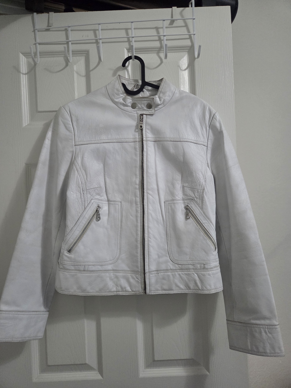 White Women's Genuine Leather Jacket With a High Collar